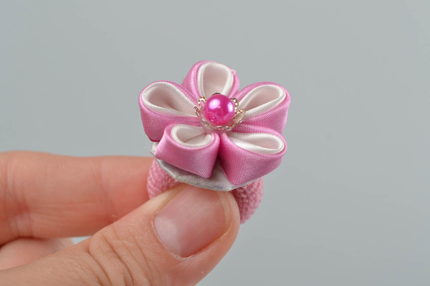 Designer hair tie in shape of flower with bead made using kanzashi technique  photo 1
