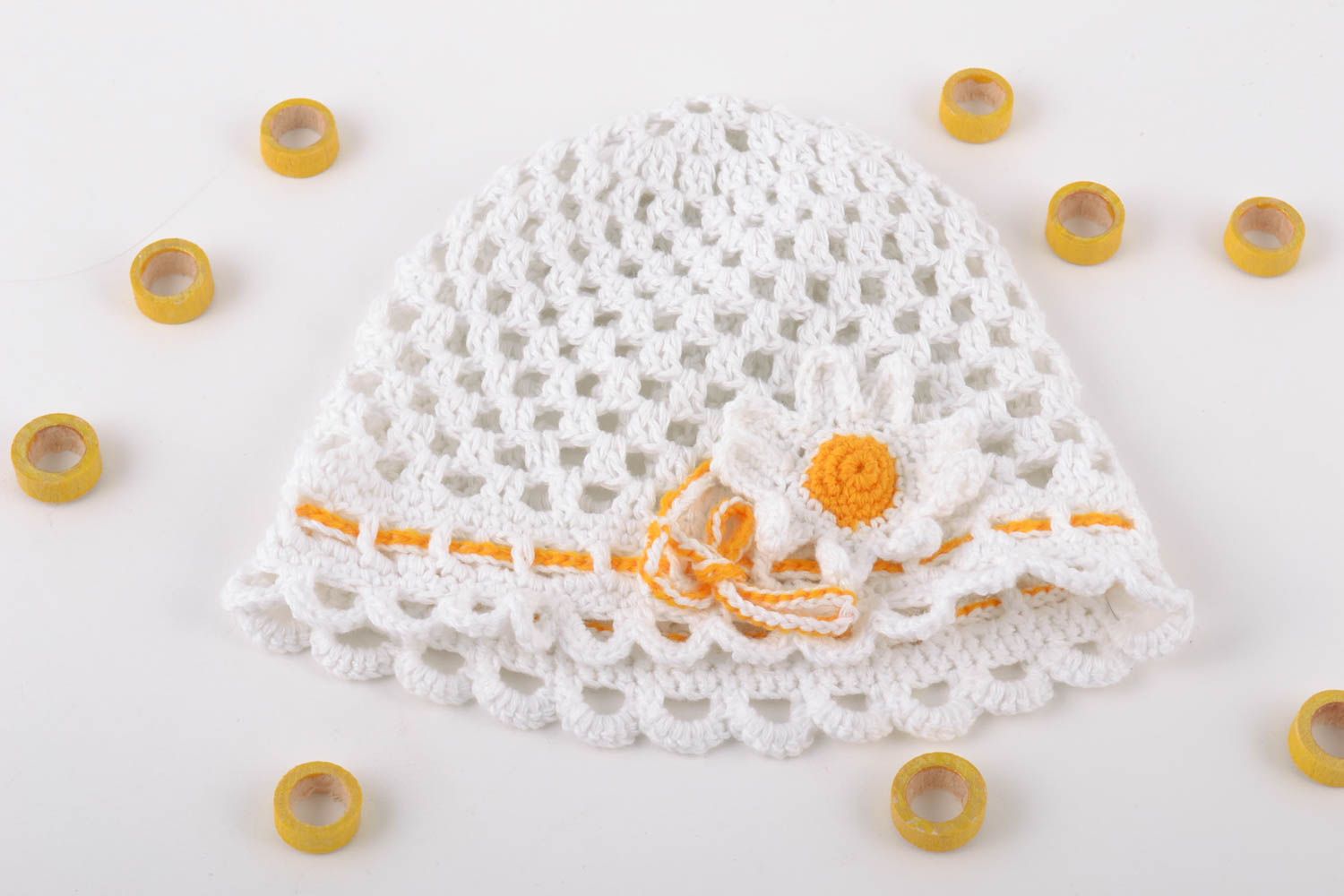 Handmade white lacy hat crocheted of cotton threads with chamomile for baby girl photo 1