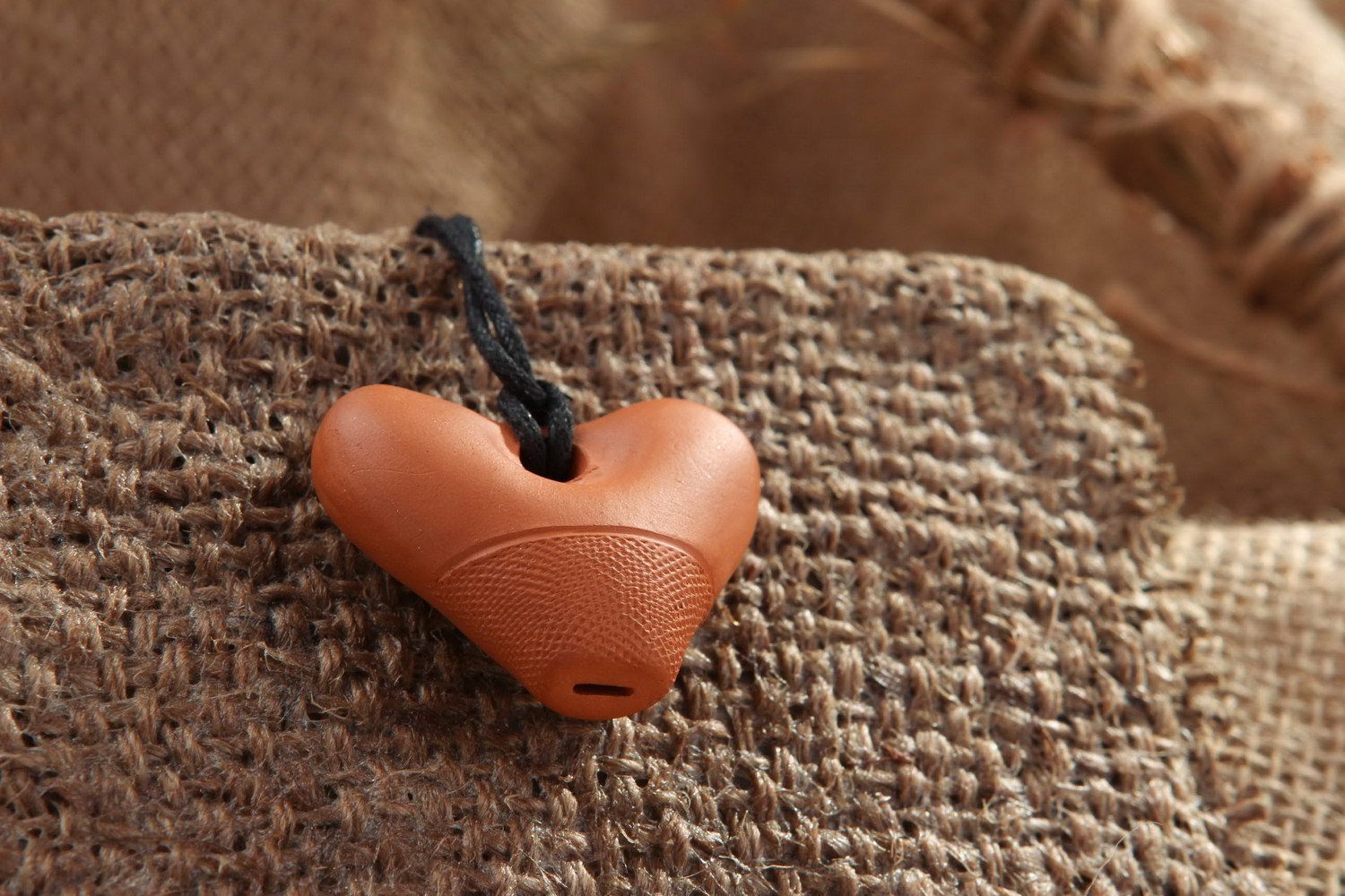 Heart-shaped tin whistle pendant made of clay photo 5