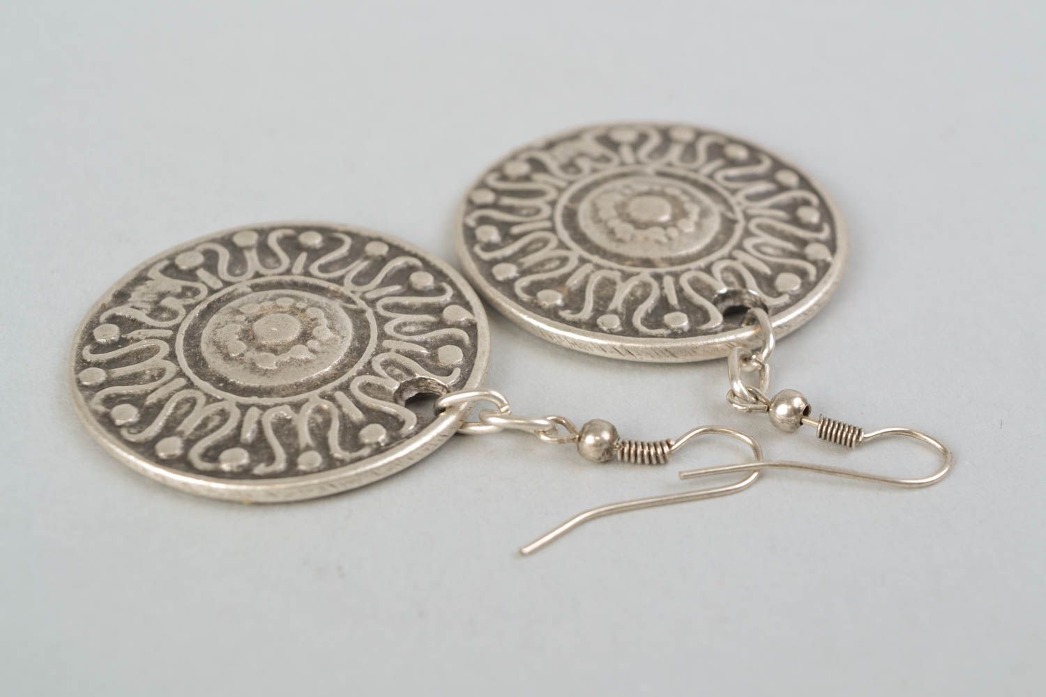 Round ethnic metal earrings with ornament photo 4