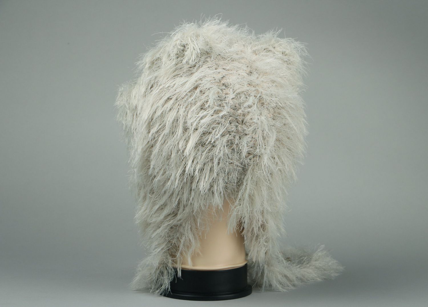 Knitted hat made of wool mixture with artificial fur photo 4
