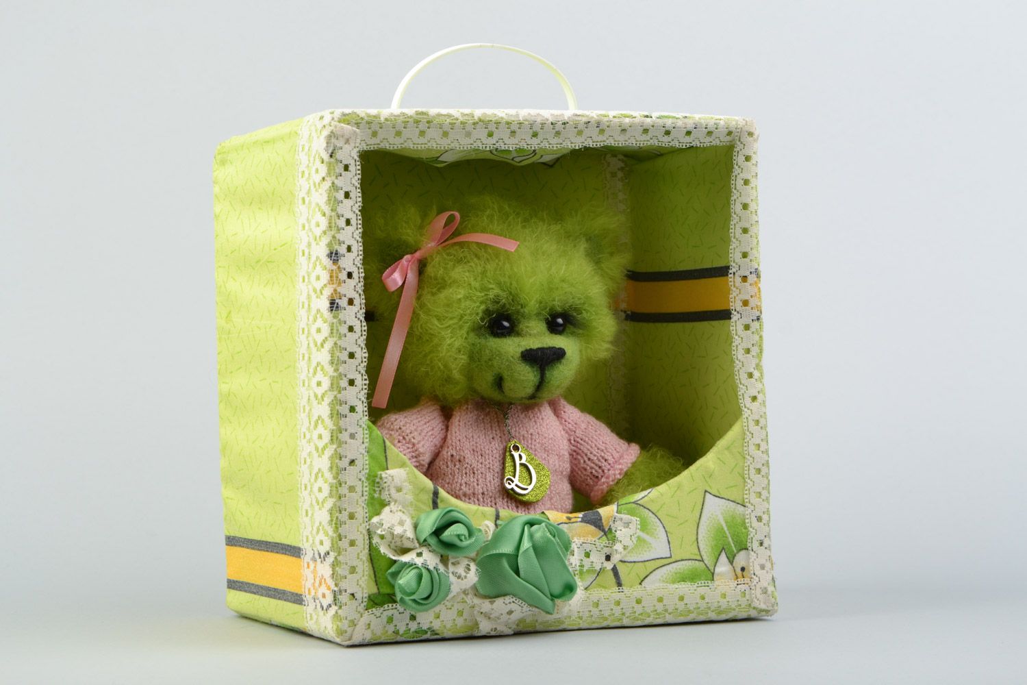 Handmade collectible crocheted soft toy bear in a box of light green color photo 3