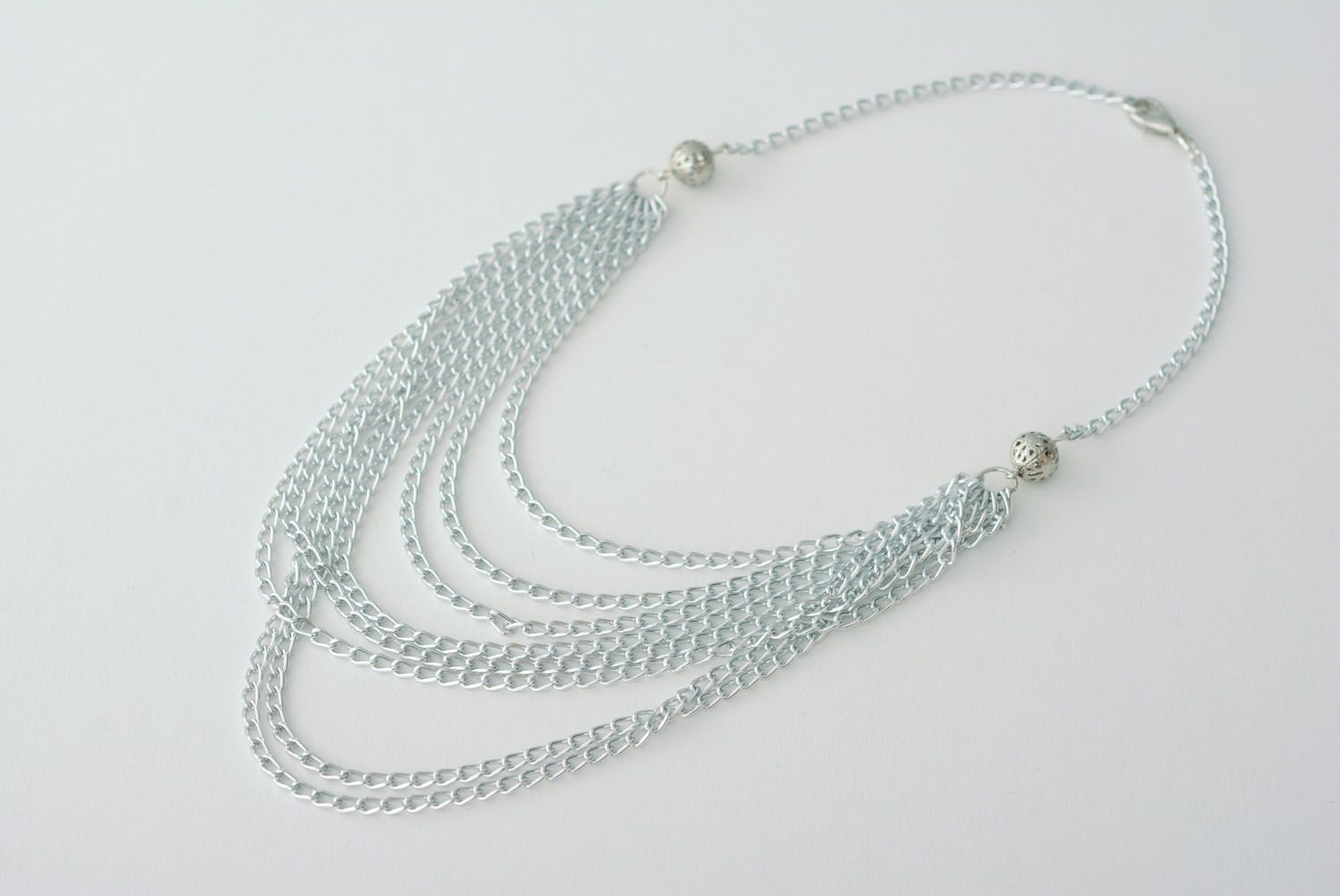 Women's necklace made of chains photo 3