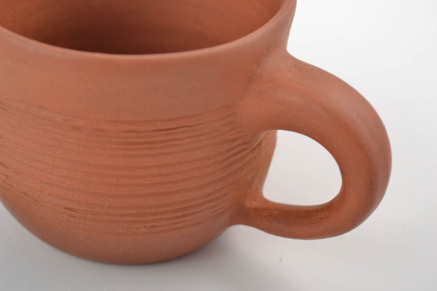 Taza de arcilla hecha a mano marrón para té 200 ml foto 4