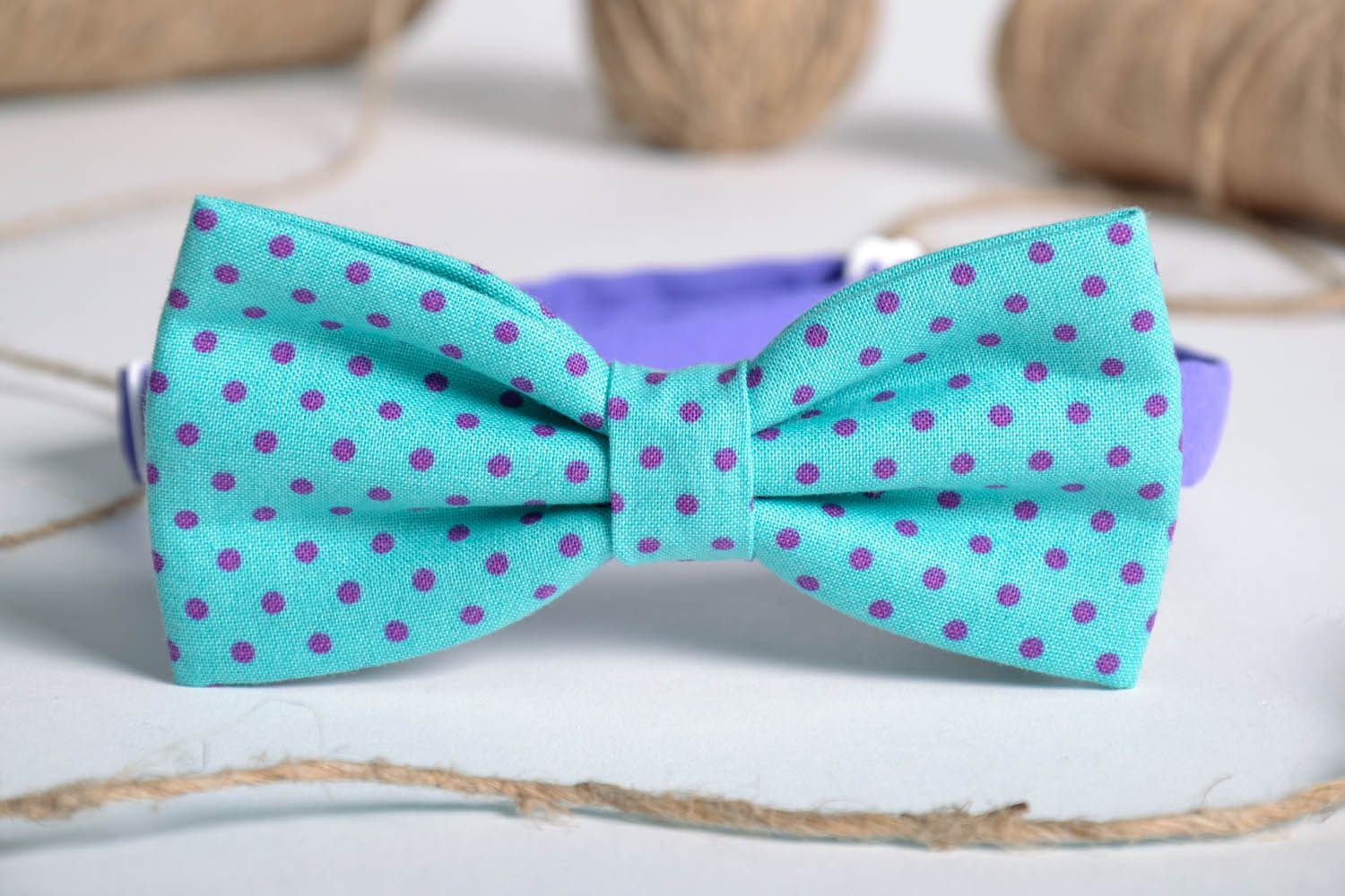 Blue bow tie with polka dots photo 1