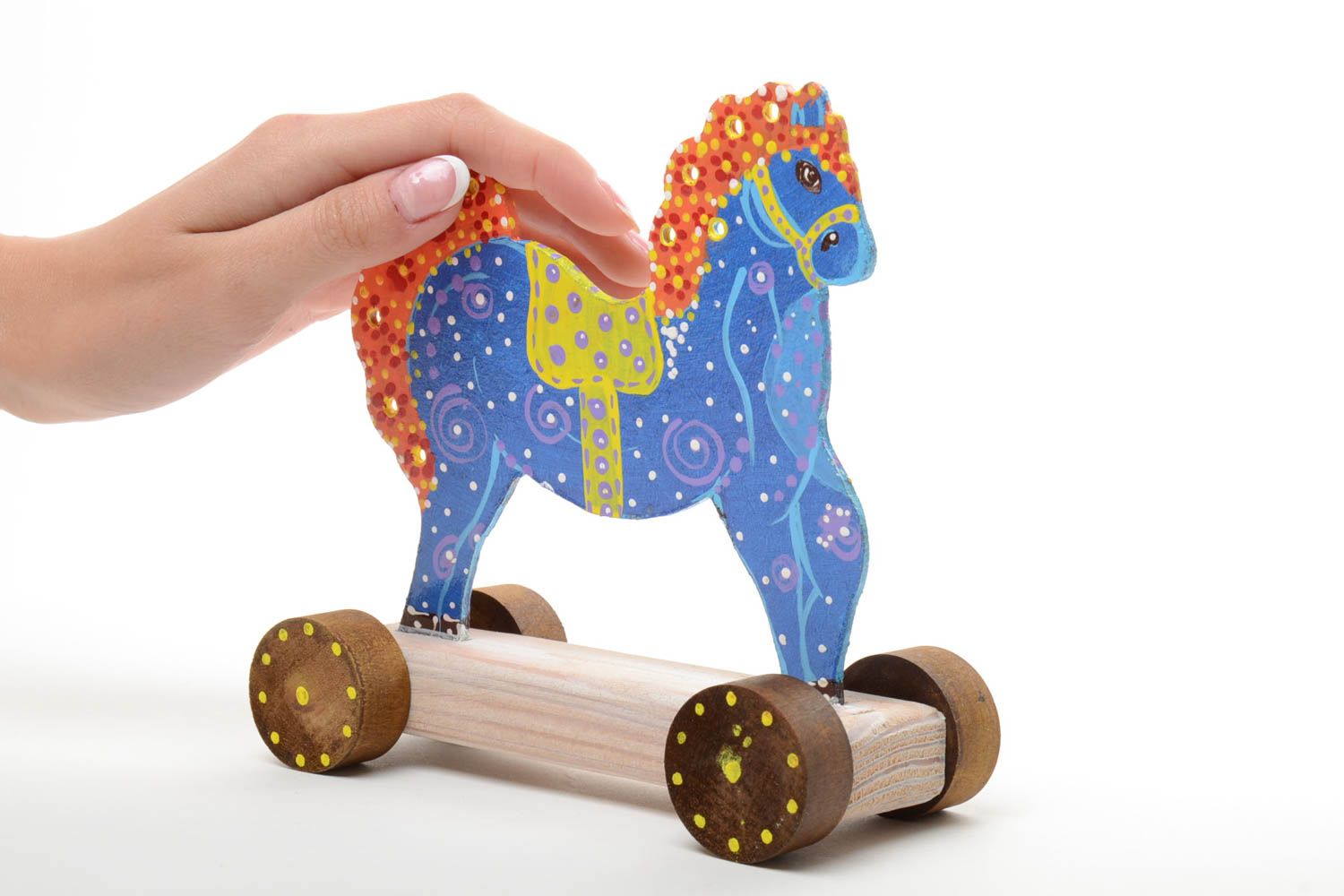 Small bright blue handmade children's wooden wheeled toy Horse photo 4