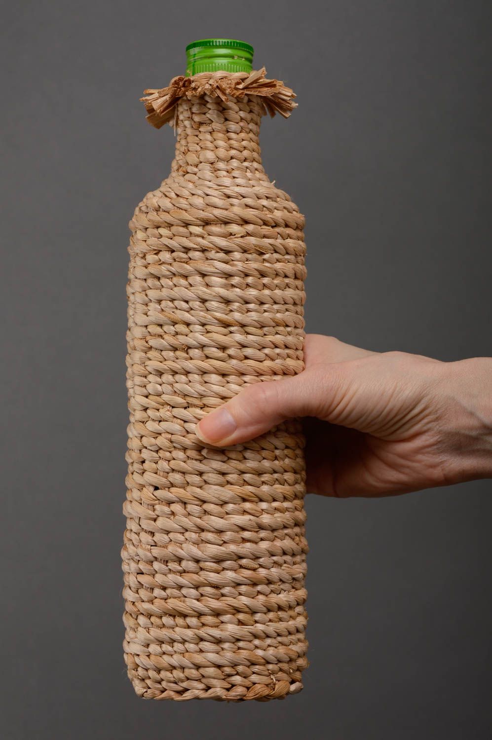 Handmade bottle woven over with reedmace photo 5