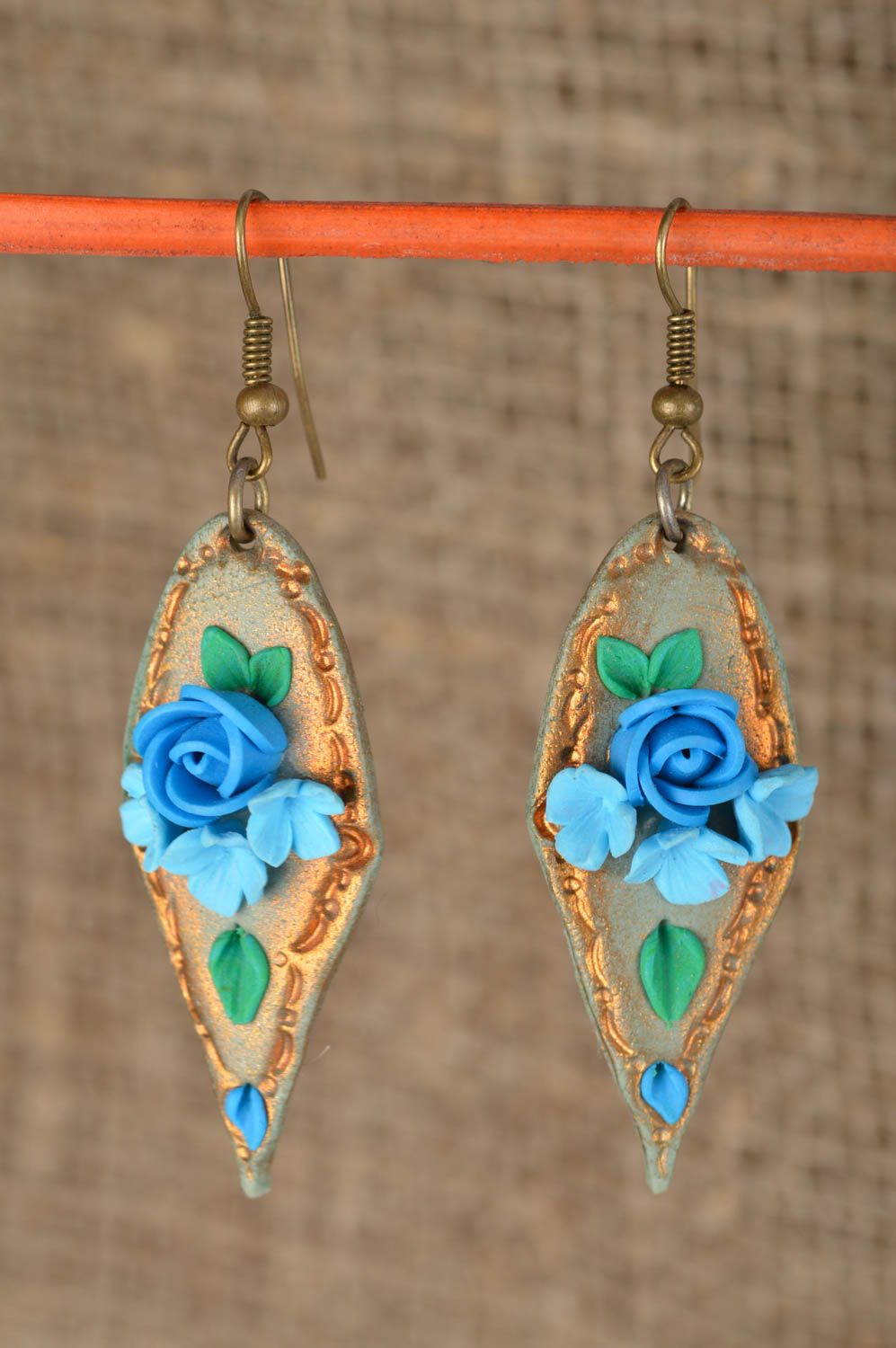 Long earrings with charms made of polymer clay for women blue roses  photo 1