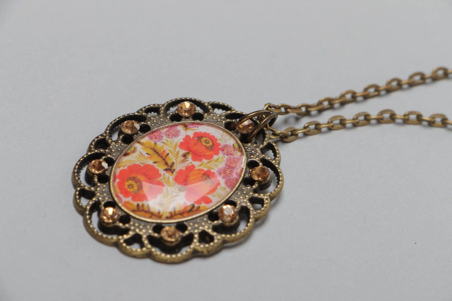 Handmade vintage metal pendant with floral image and glass glaze on chain 700 mm photo 3