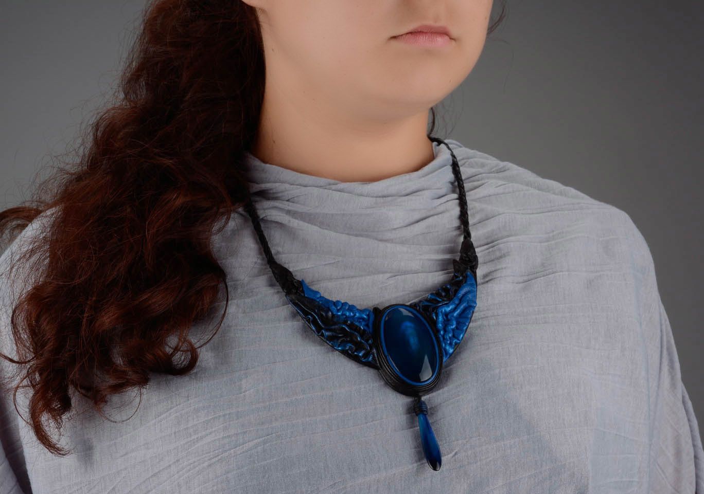 Necklace made of blue leather and horn photo 4