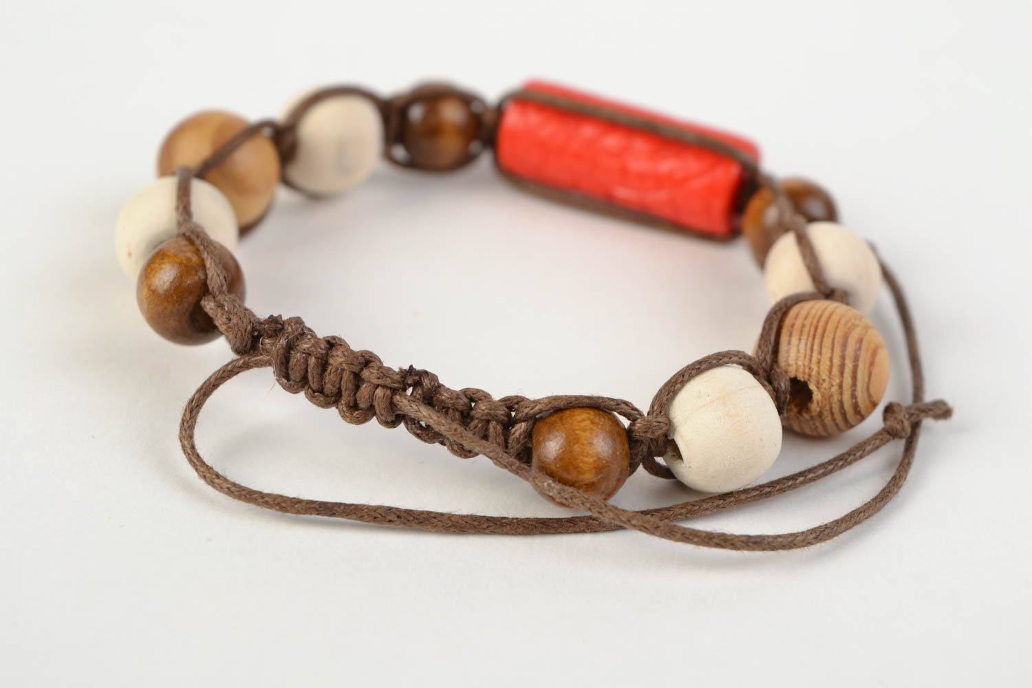 Handmade stylish bracelet with large wooden beads woven of cord red and brown photo 5