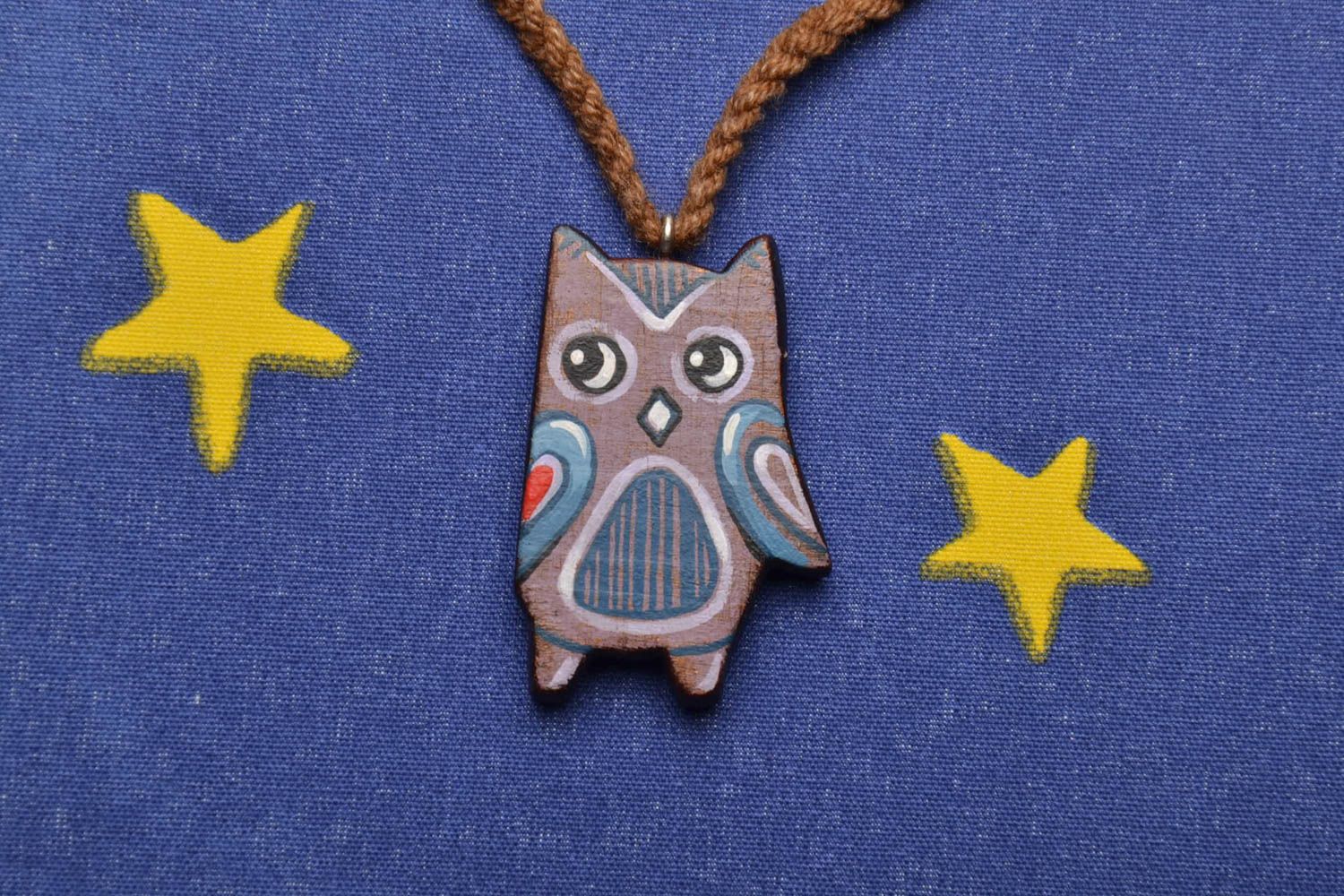 Wooden pendant in the shape of owl photo 1