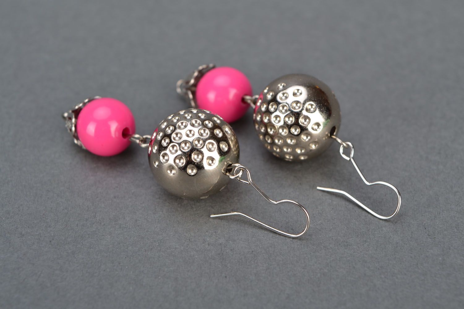 Bright pink earrings with charms photo 3