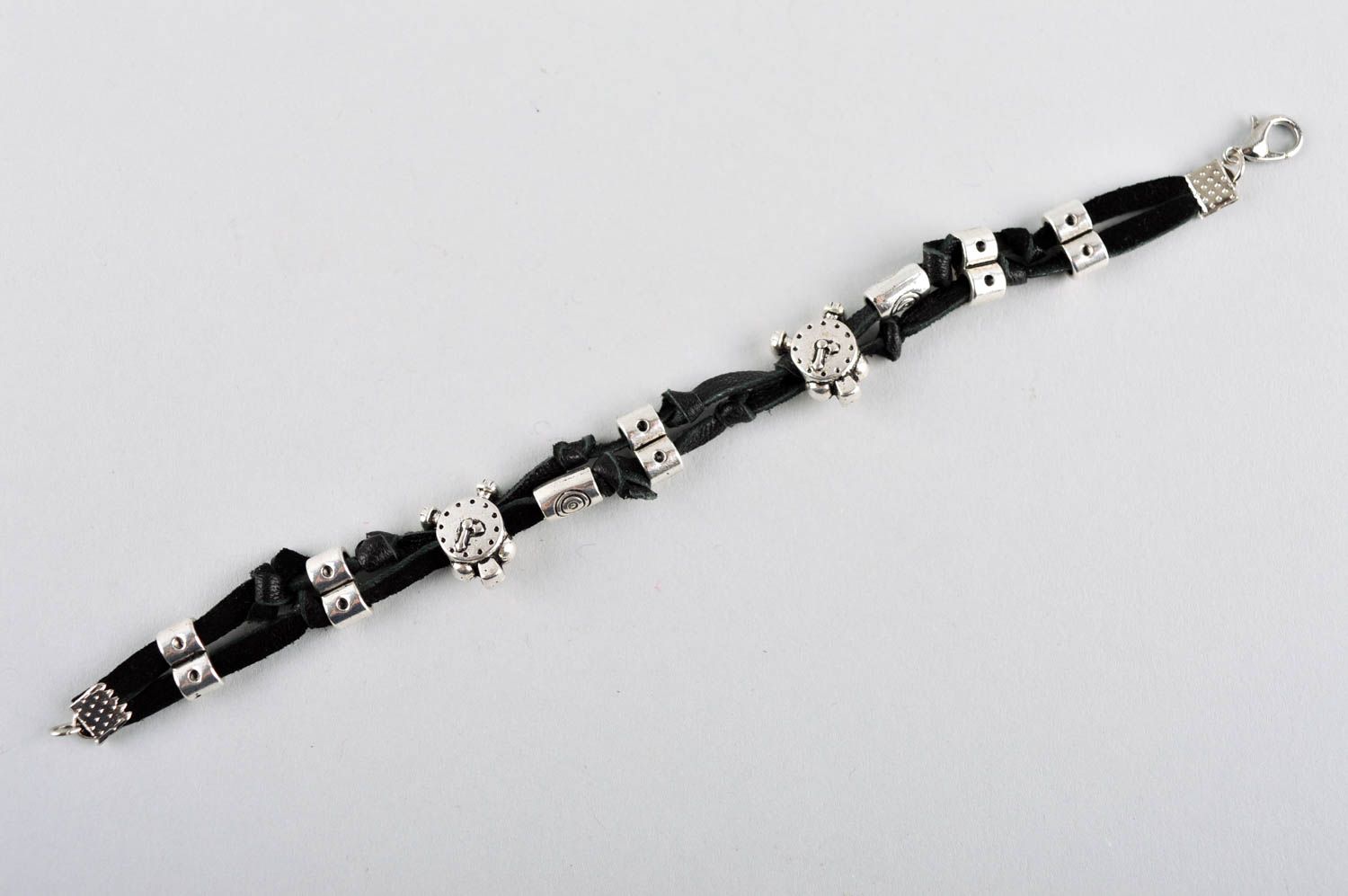 Handmade black cord bracelet with unisex metal charms and beads photo 5