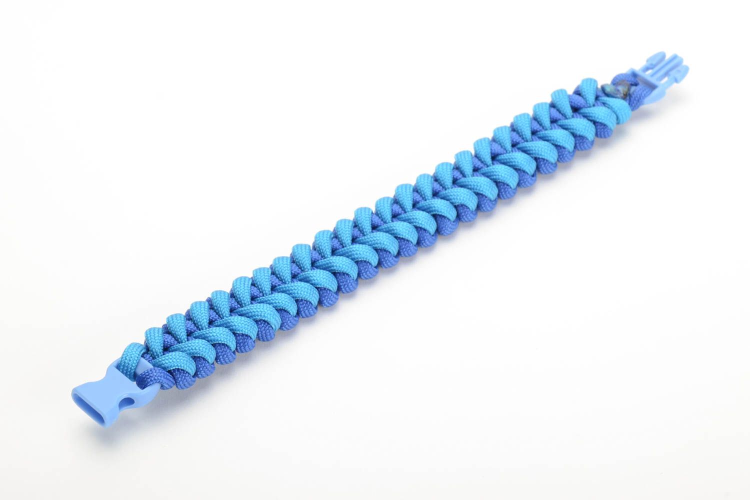 Handmade wrist survival bracelet woven of blue parachute cord with plastic fastener photo 4