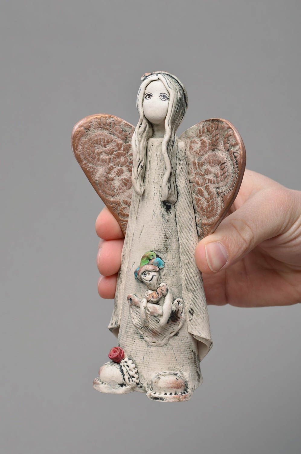 Unusual small handmade light porcelain statuette of angel with clown photo 4