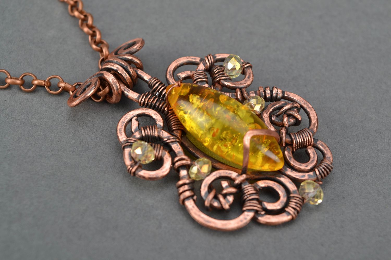Wire wrap neck pendant with natural amber photo 3