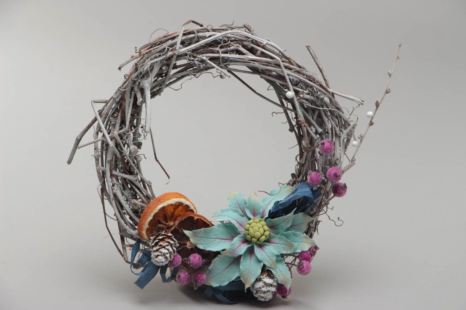 Beautiful handmade wicker door wreath with polymer clay flowers for home decor photo 2