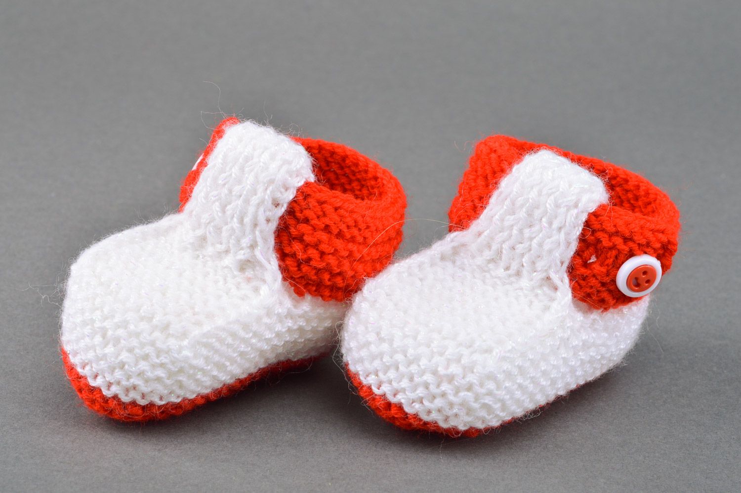 Red and white handmade knitted half-woolen baby booties with buttons photo 5