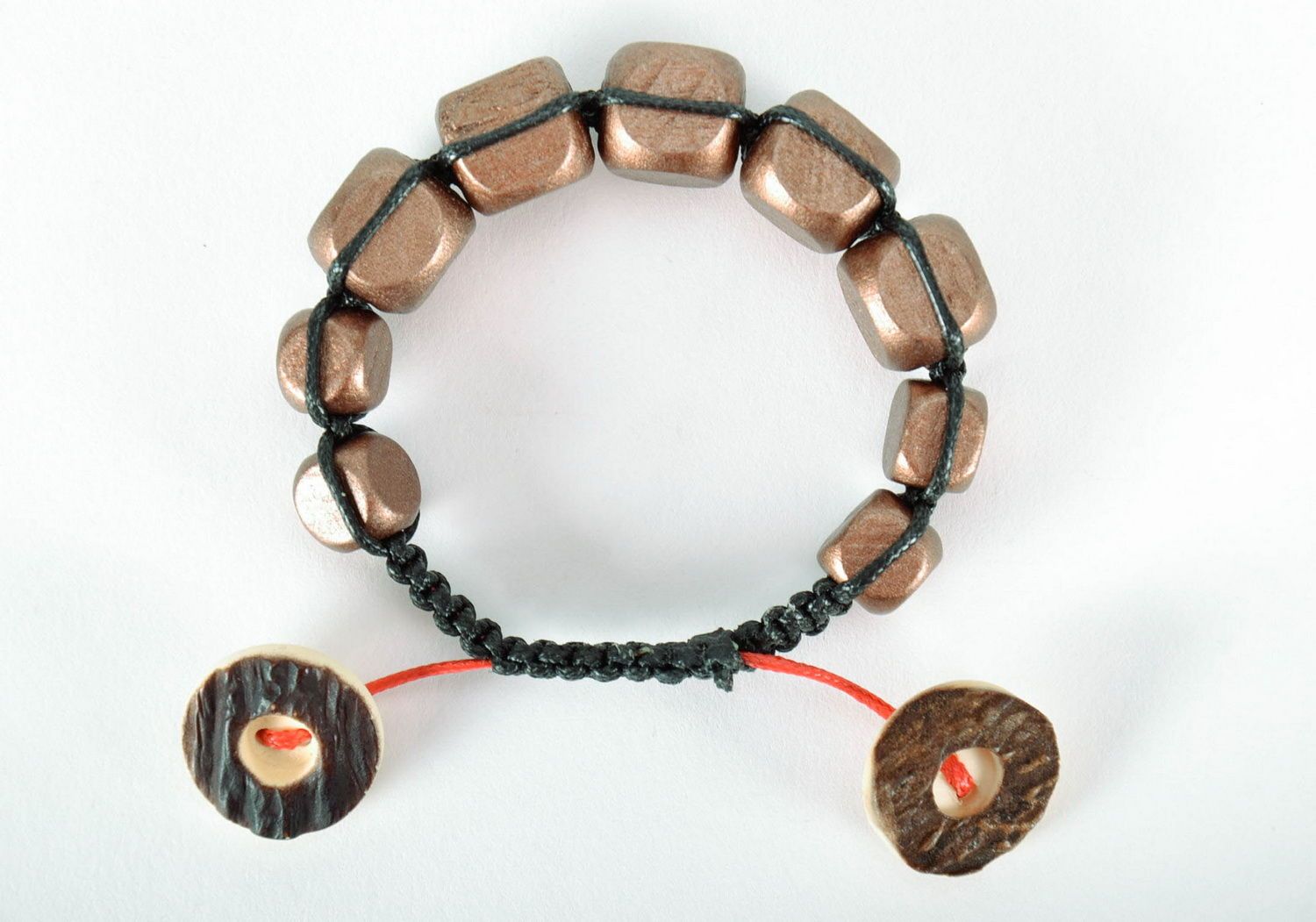 Bracelet made of wooden beads and plastic buttons photo 3