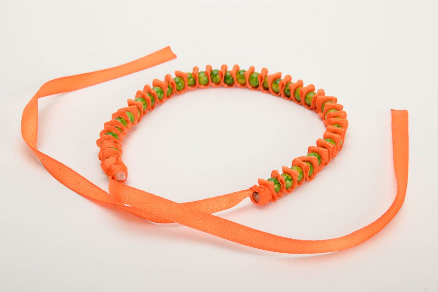 Orange handmade bracelet woven of satin ribbon and glass beads Fantasy photo 3