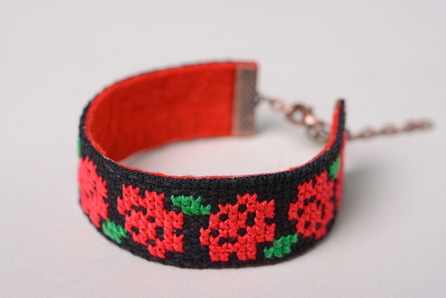 Black wrist bracelet with handmade contrast ethnic cross stitch embroidery for women photo 2