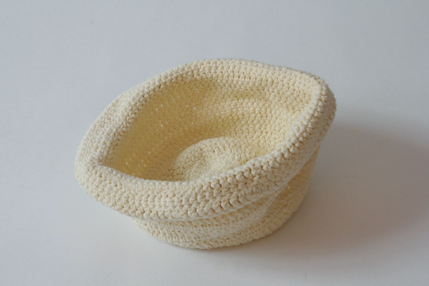 Knitted white hat photo 2