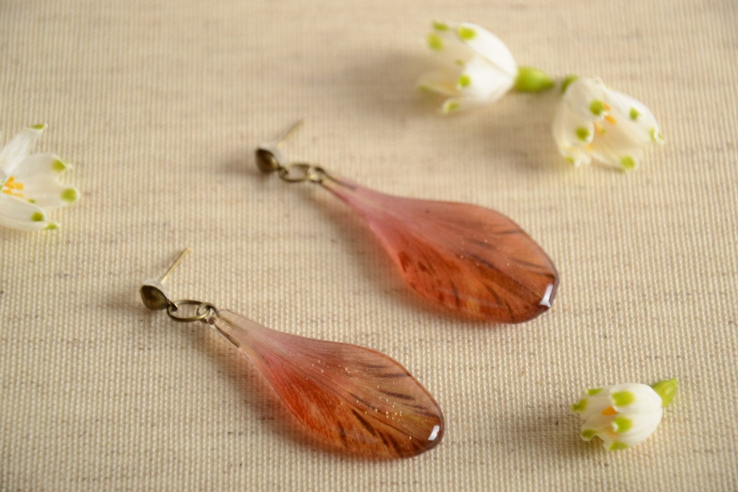 Festive handmade earrings with real flower petals coated with epoxy resin photo 1