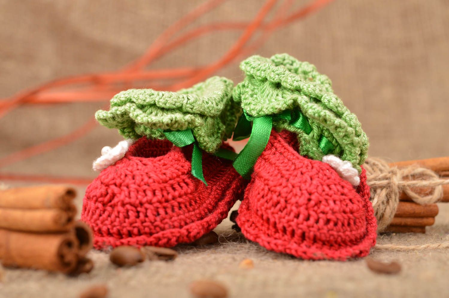 Handmade baby shoes crocheted of acrylic threads red and green with bows photo 1