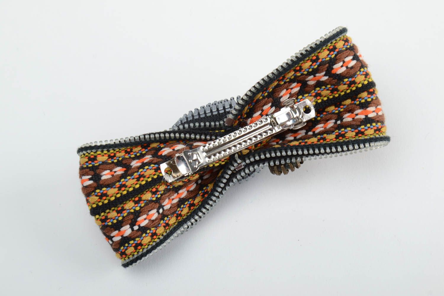 Handmade decorative hair clip with zipper bow embroidered with mouline threads photo 4