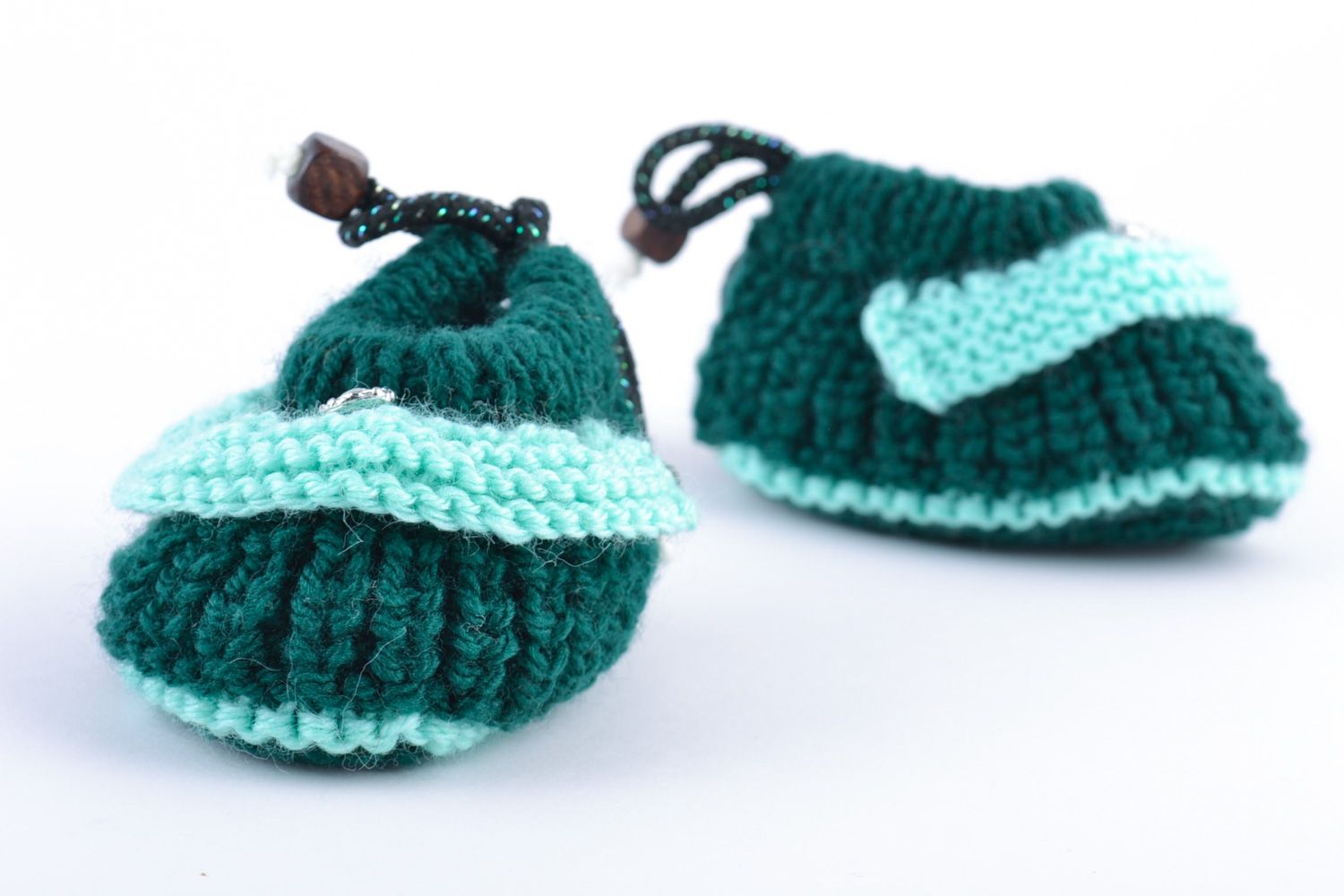 Hand knitted wool baby booties of green color photo 5
