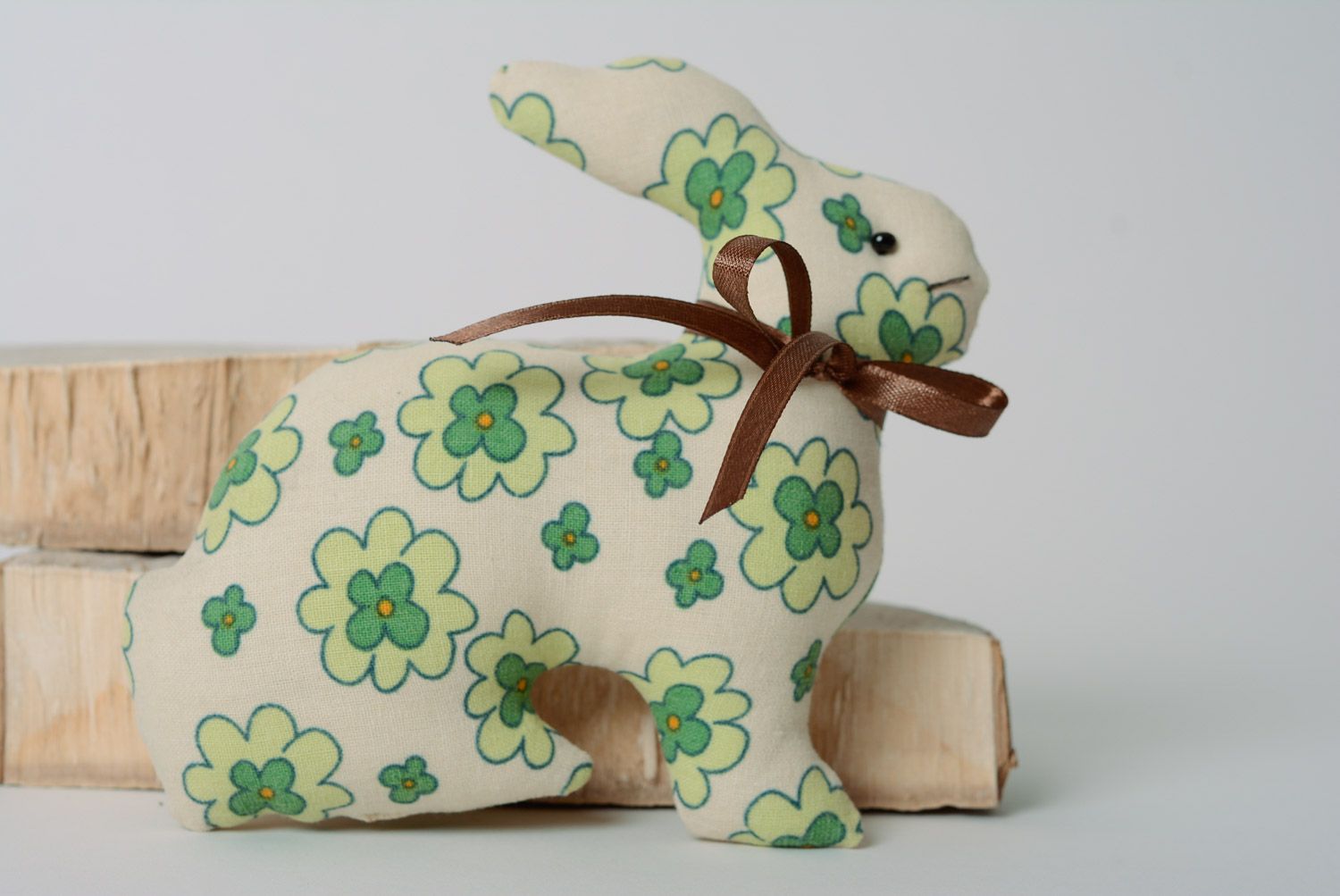 Handmade cotton fabric soft toy hare of green color with flower print photo 1