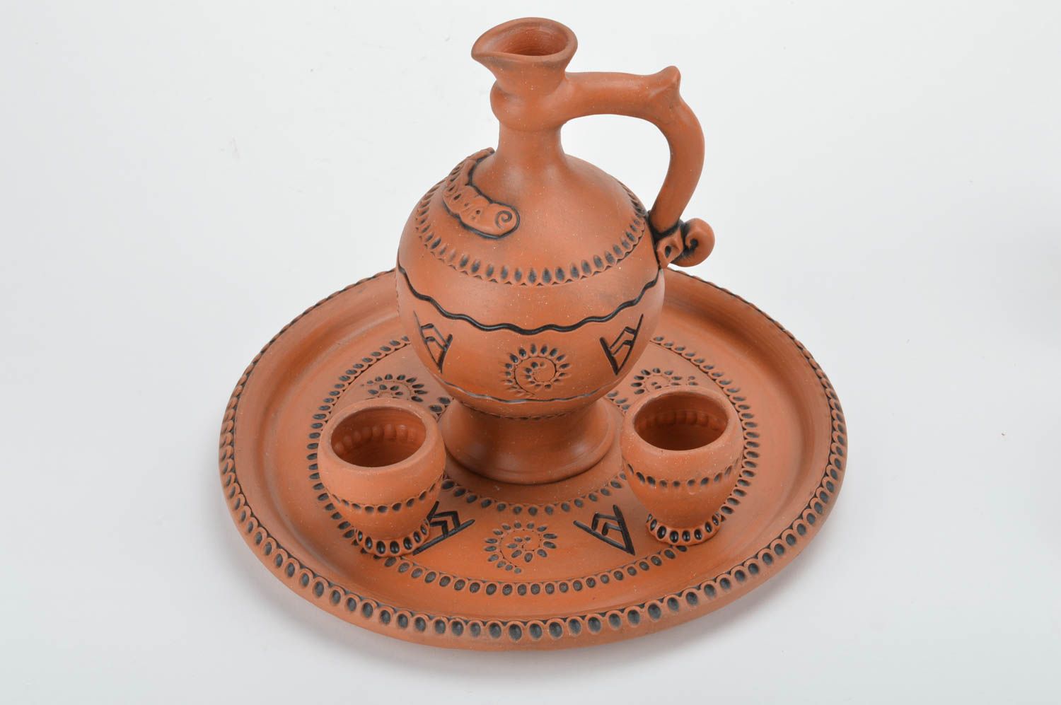 Conjunto de vajilla cerámica artesanal bandeja dos copas de 50 ml y jarro  foto 5