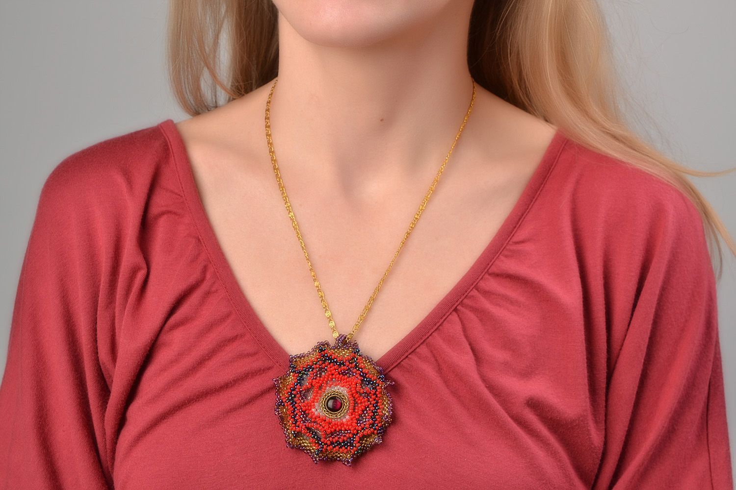 Handmade designer bead embroidered pendant with stones in red color palette photo 1