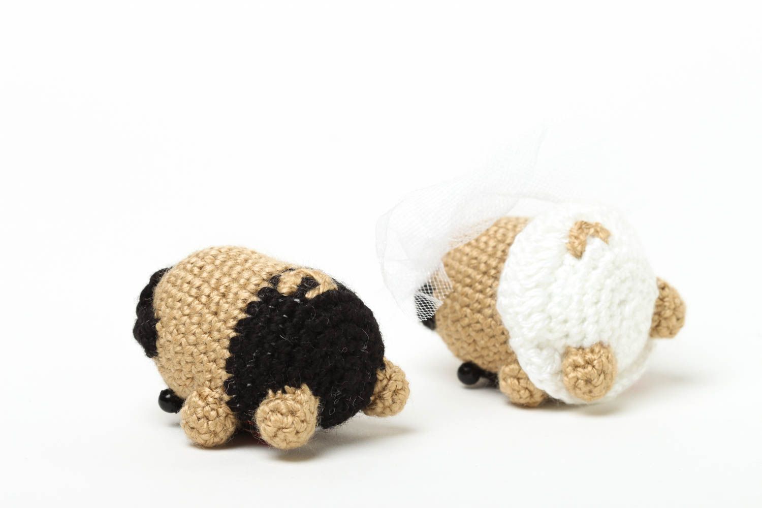 Set of two knitted stuffed pugs. Boy and girl photo 4