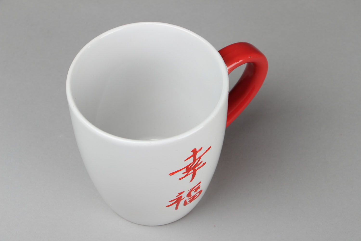 Japanese style white ceramic coffee or tea cup with red handle photo 3