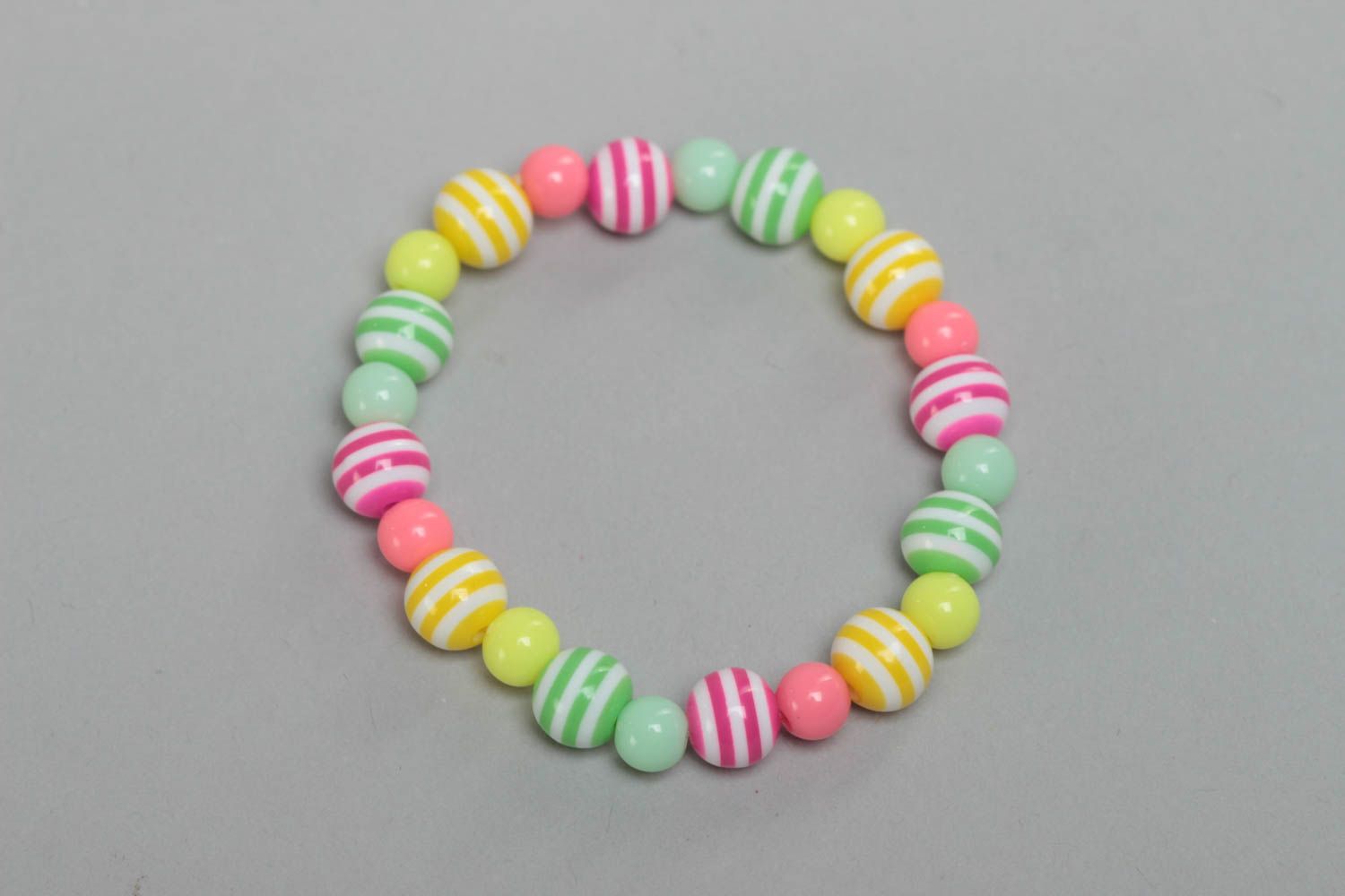 Colorful striped handmade wrist bracelet with plastic beads for girl photo 2