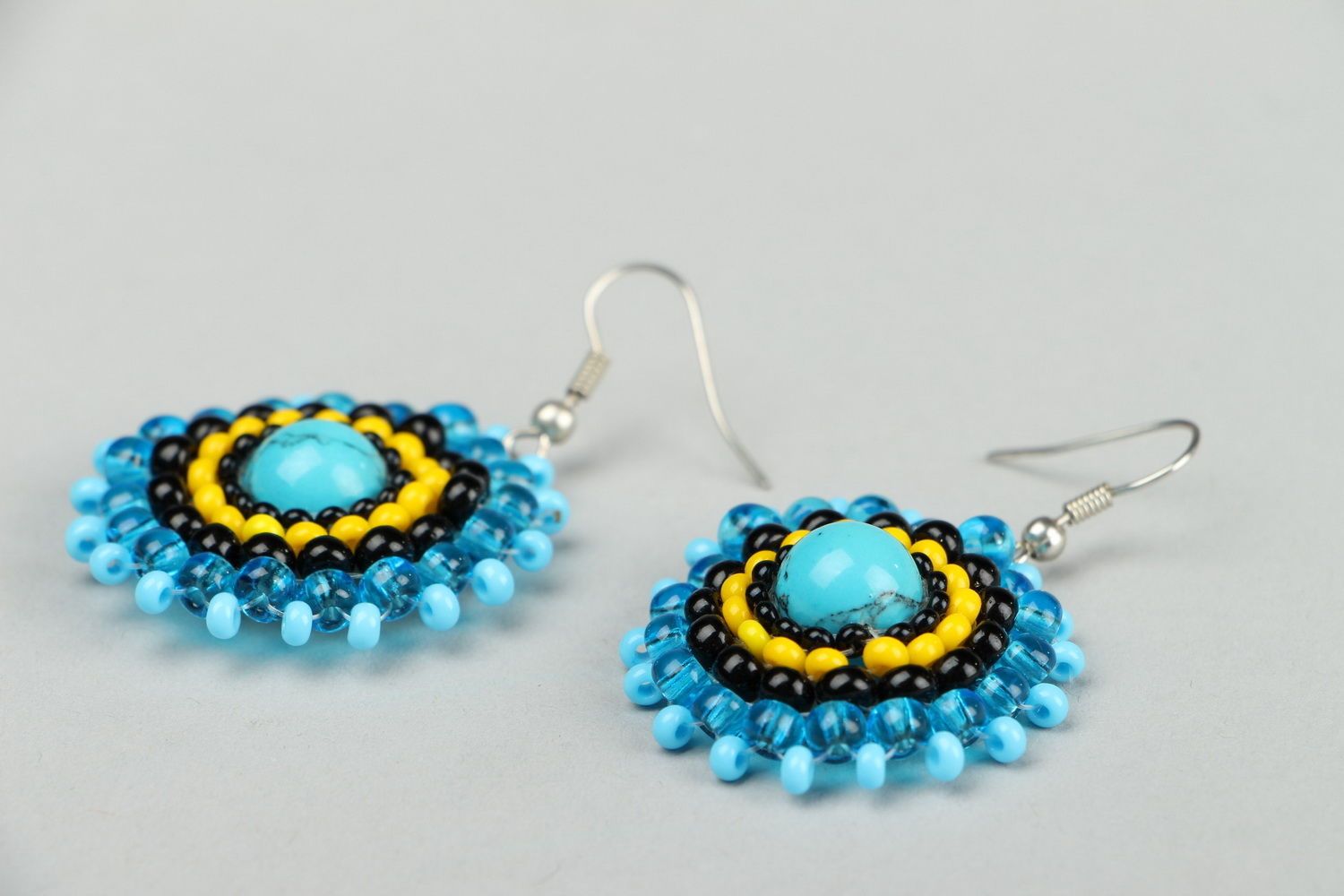 Earrings made of beads and turquoise photo 1