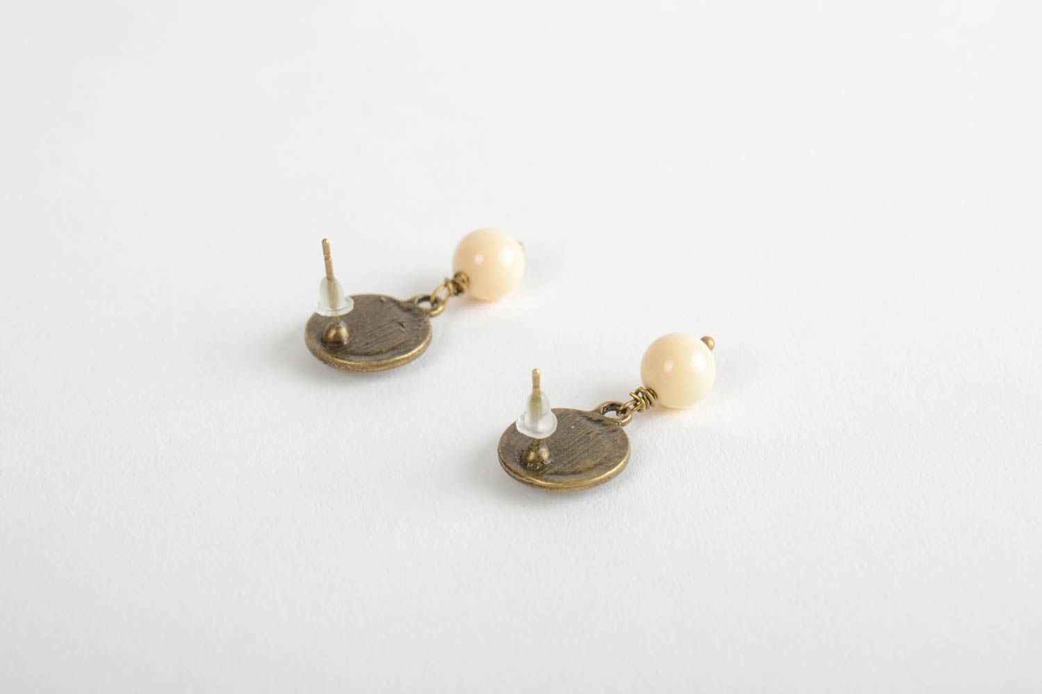 Handmade round epoxy resin earrings with beads on the basis of the brass photo 3
