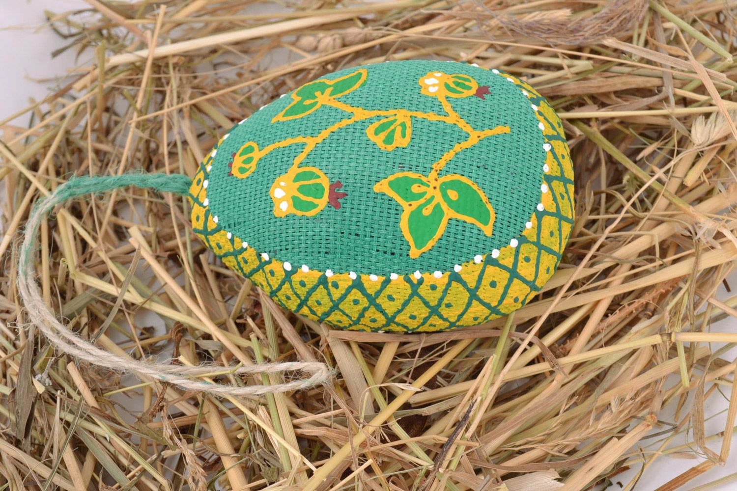 Homemade decorative soft wall hanging Easter egg of green color with ornaments photo 1
