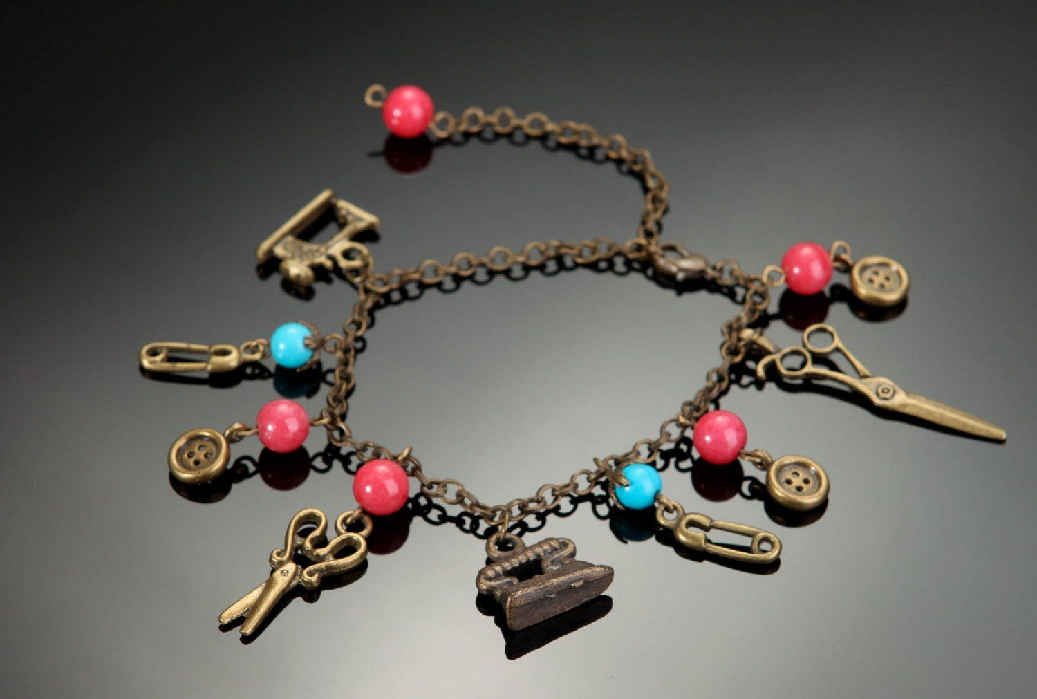 Bronze bracelet with coral and turquoise photo 1