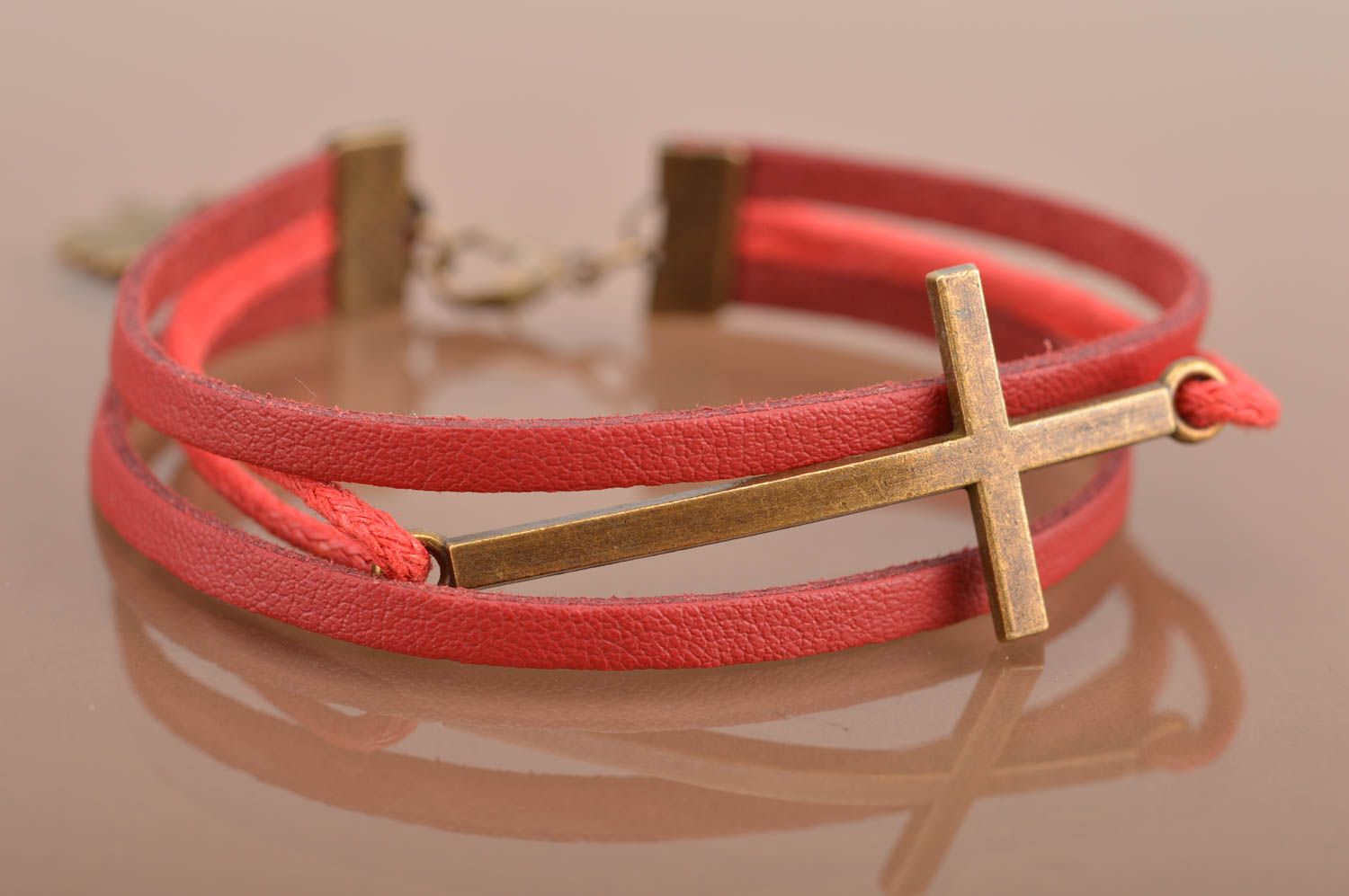 Handmade bracelet made of chamois leather laces with insert in shape of cross photo 2