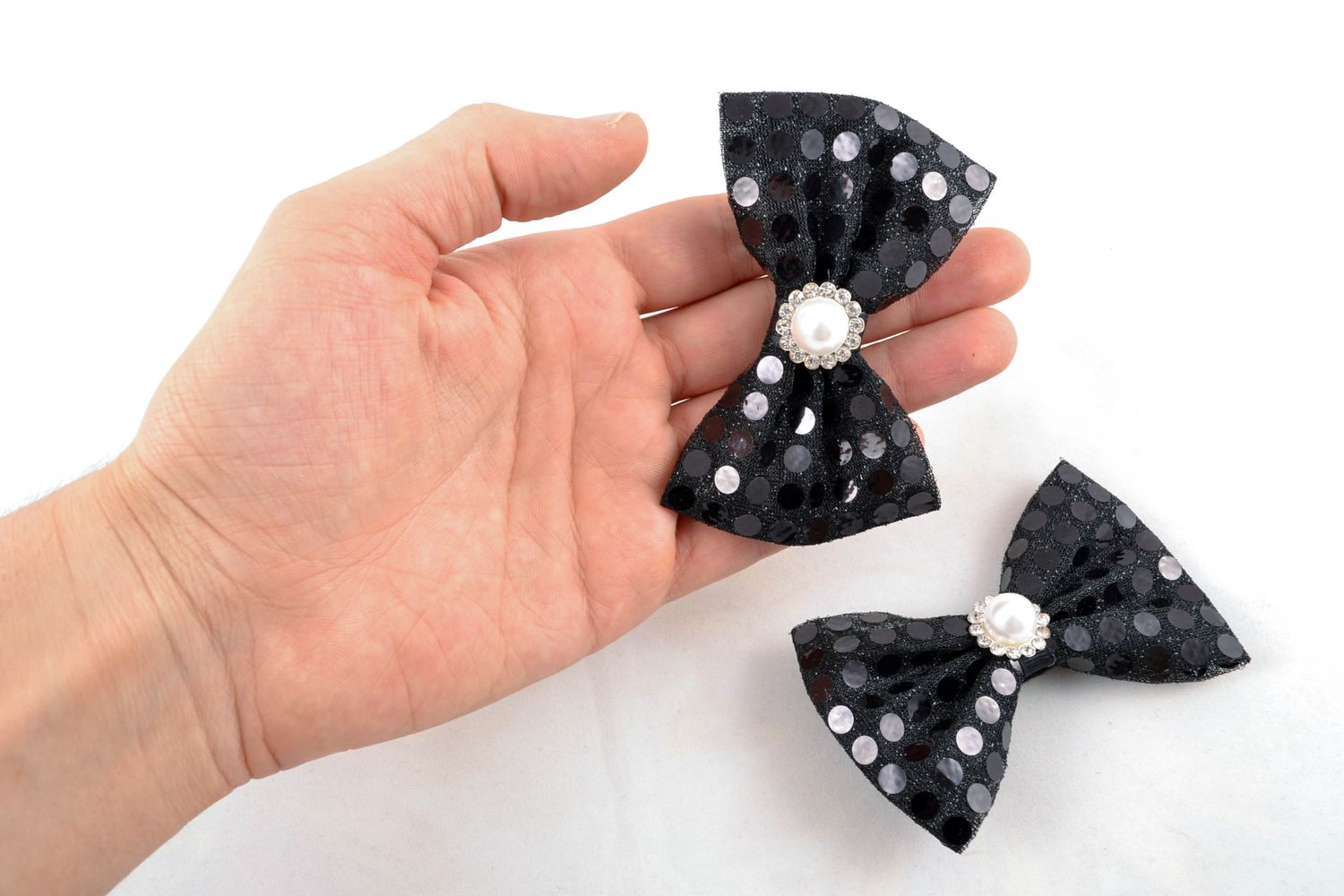 Festive hair clips with black bows 2 items photo 1