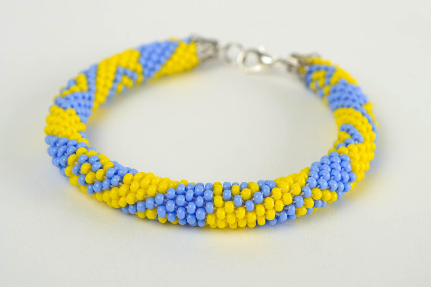 Handmade beaded cord bracelet in yellow and blue colors for women photo 2