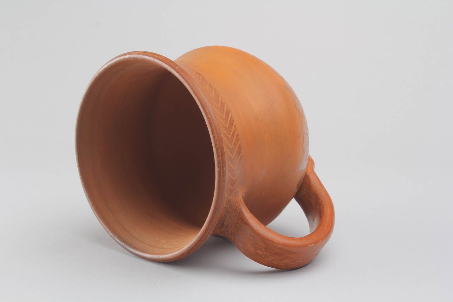 Terracotta color Mexican style clay cup with handle and rustic pattern photo 4