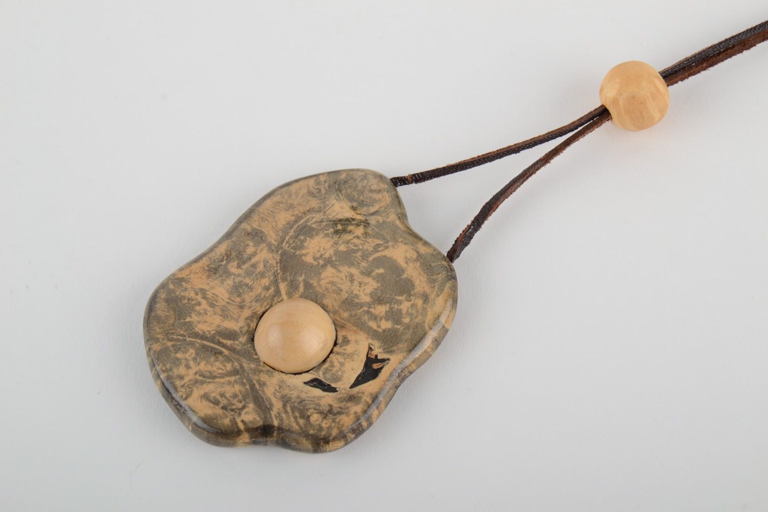 Handmade wooden carved tinted neck pendant of irregular shape for women photo 3