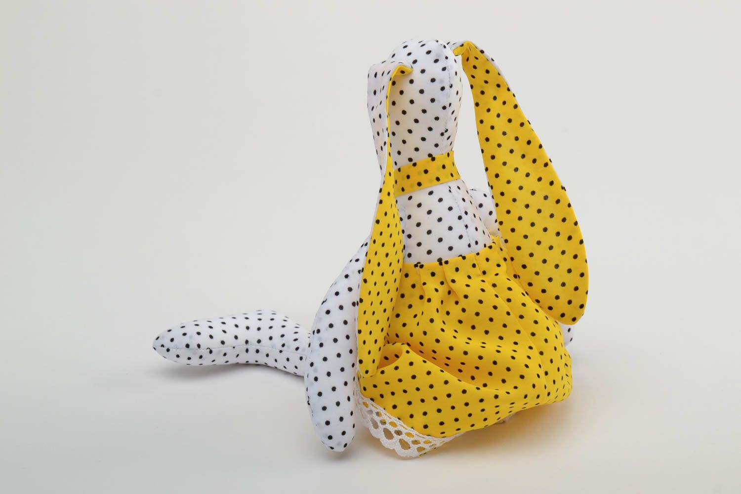 Handmade soft toy sewn of staple fabric rabbit in bright yellow dress with lace photo 4