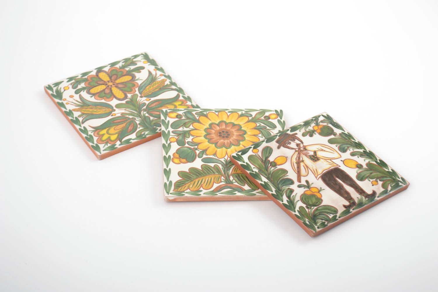 Set of handmade decorative ceramic tiles painted with engobes with ethnic motifs photo 3
