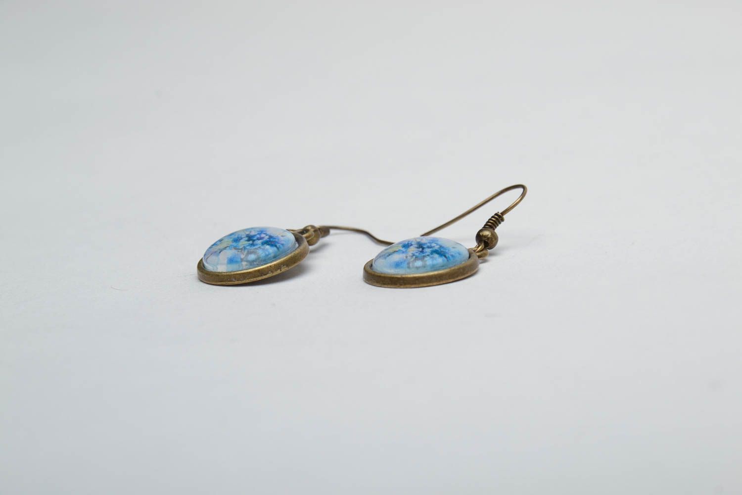 Round earrings coated with epoxy resin photo 3