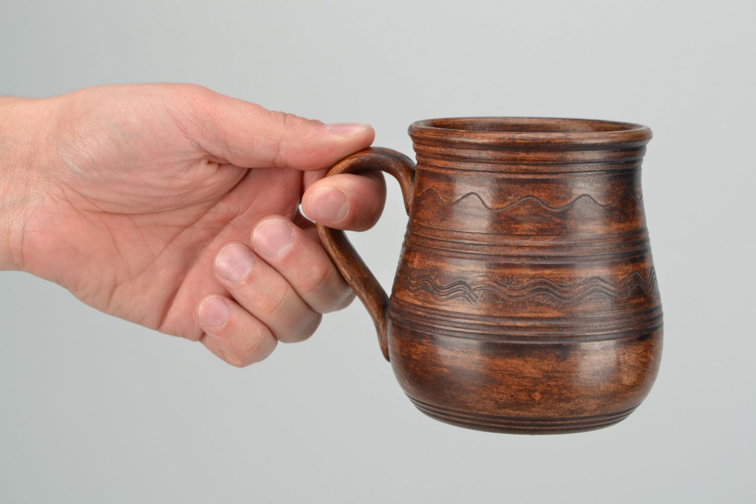 11 oz clay glazed coffee cup in rustic design with handle and no pattern photo 2